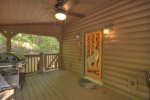 Large open firs floor deck with built in seating and hot tub.